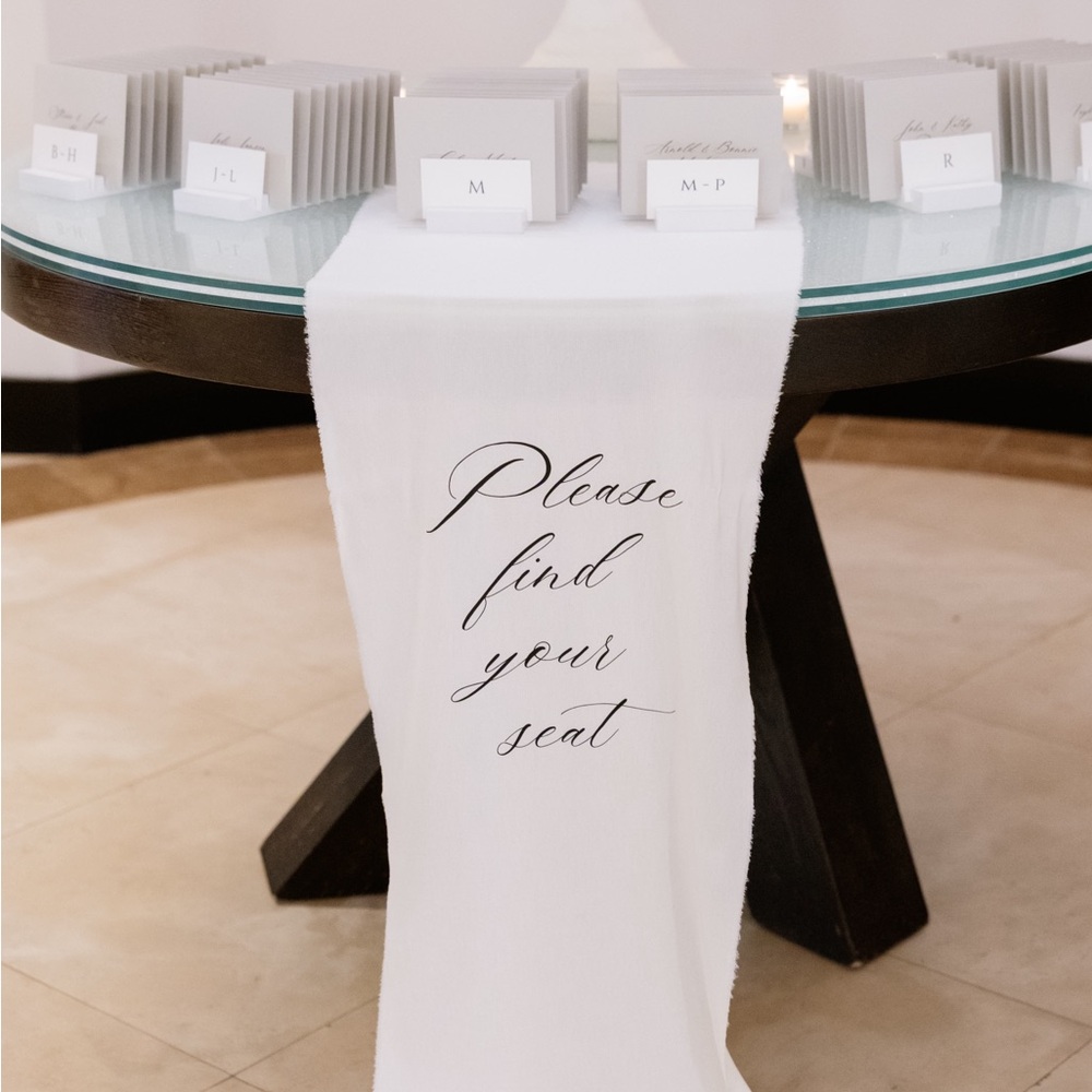 “Please find your seat” linen sign